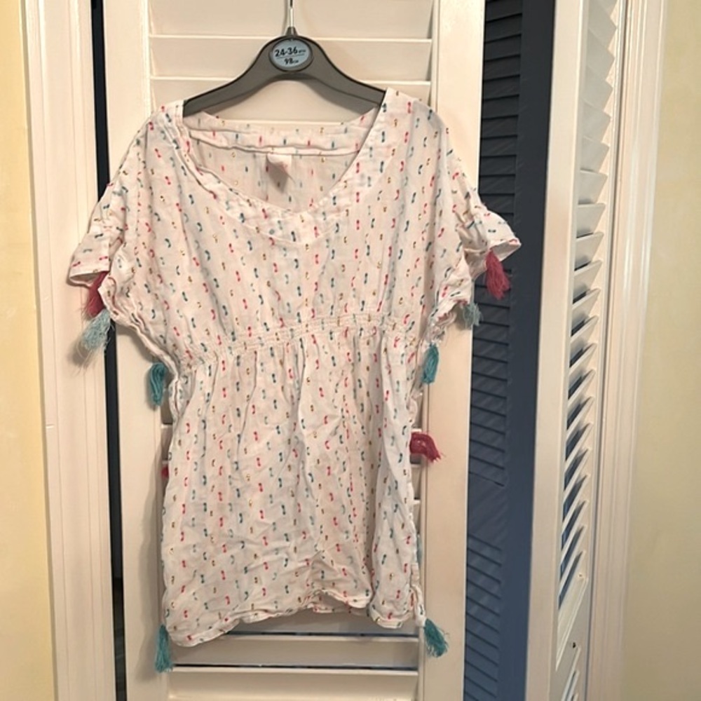 Girl’s multicolored swim coverup